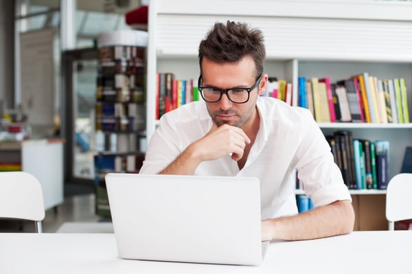 A man working with a laptop