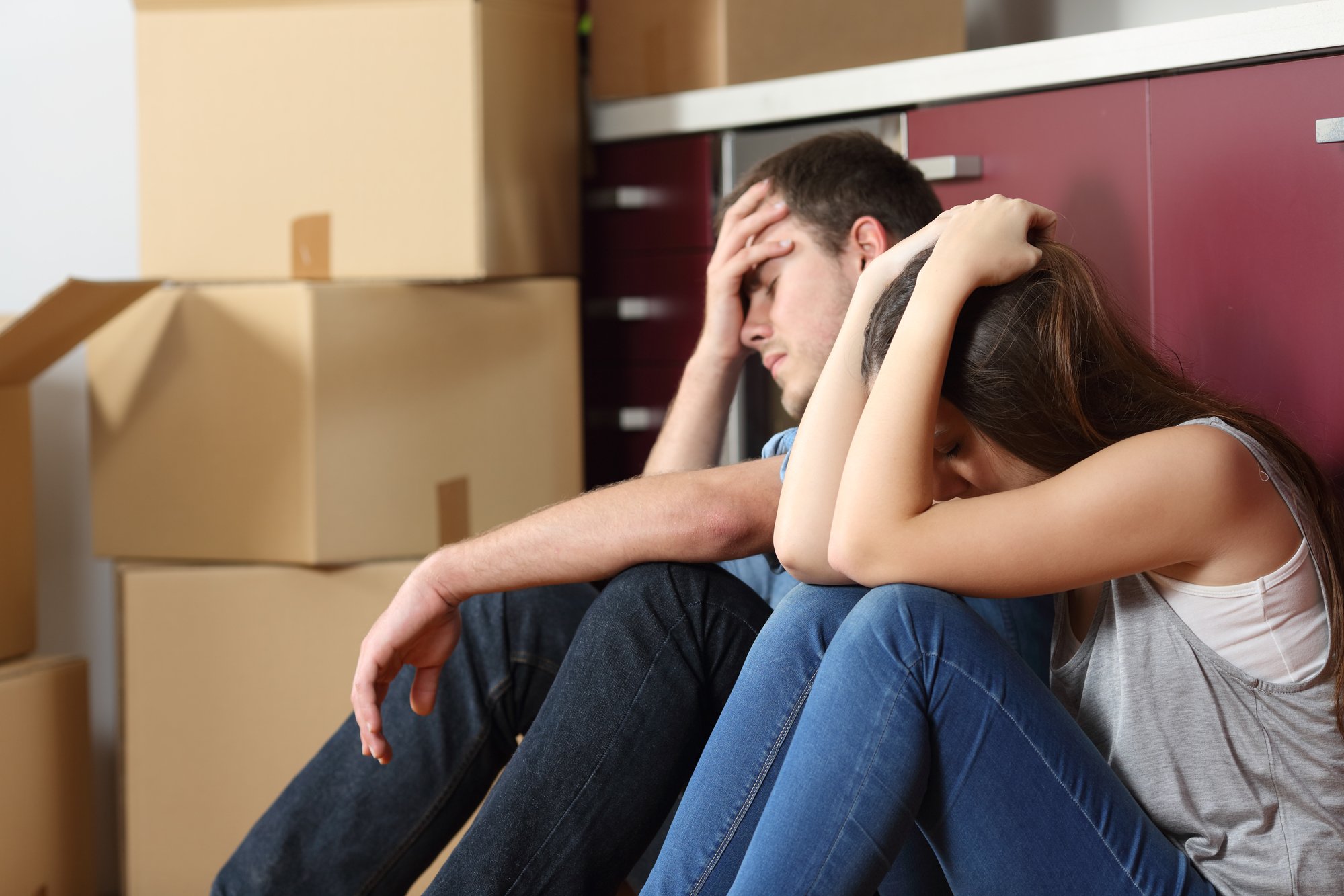 Sad evicted couple worried moving house